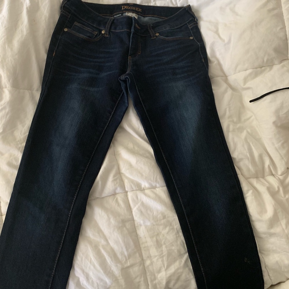Skinny jeans, dark wash. Super stretchy, but firm
